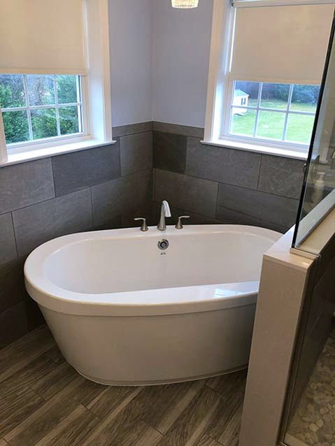 Freestanding tub with slate tile surround