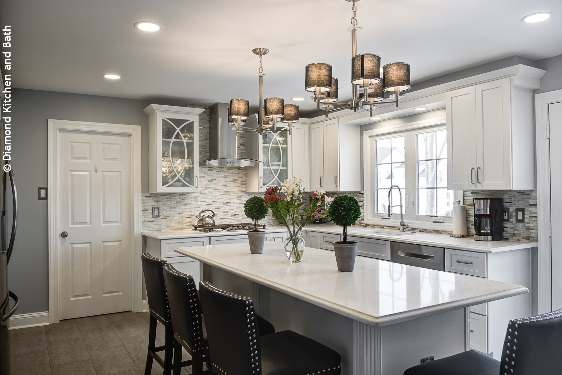 White kitchen remodel with island seating