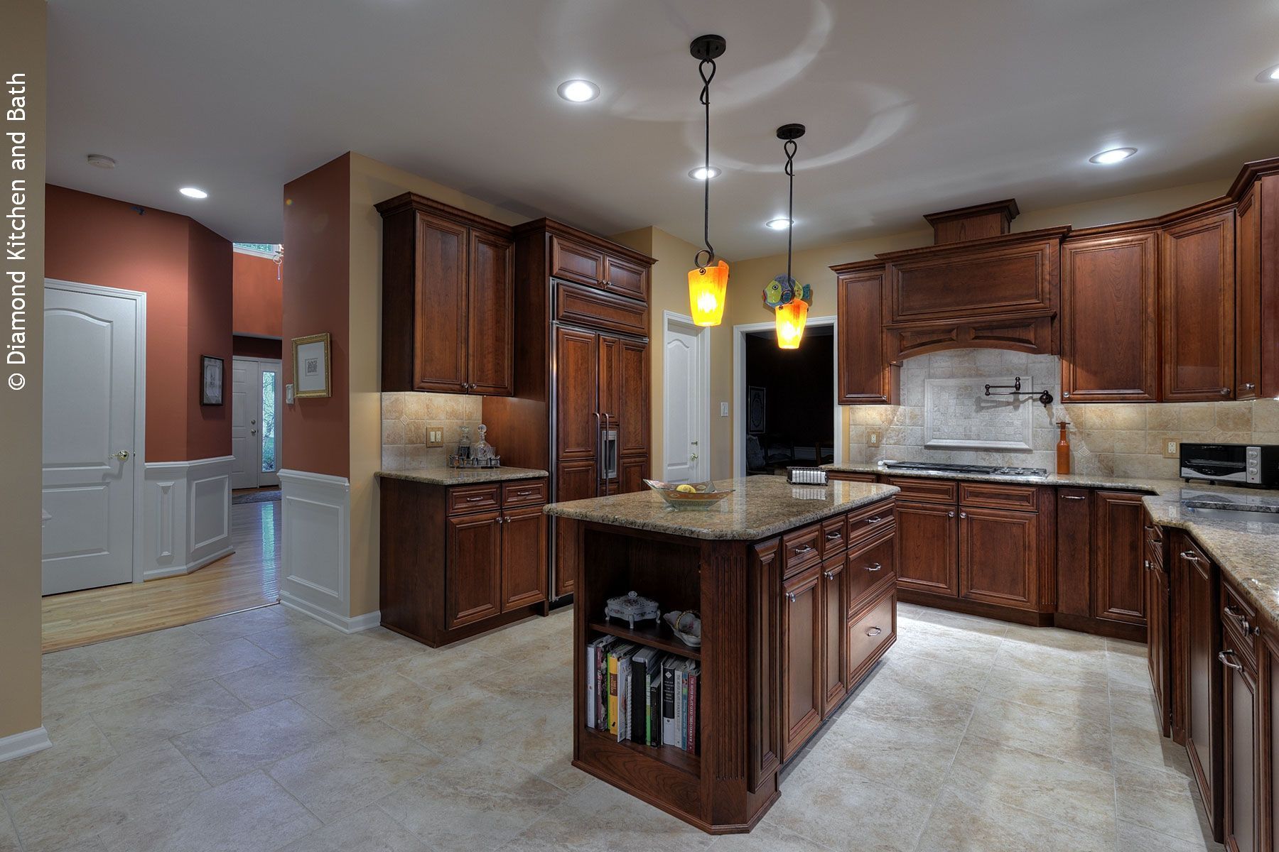 Stained wood cabinets with granite countertops installed by Diamond Kitchen and Bath